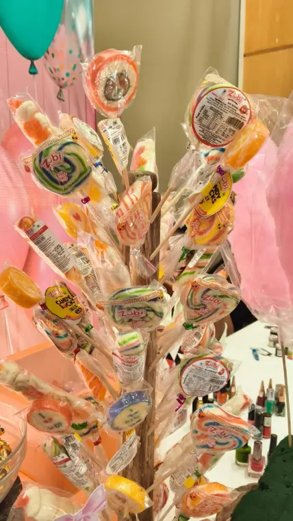 Lollipop tree on a candy theme birthday dessert table in Lucknow